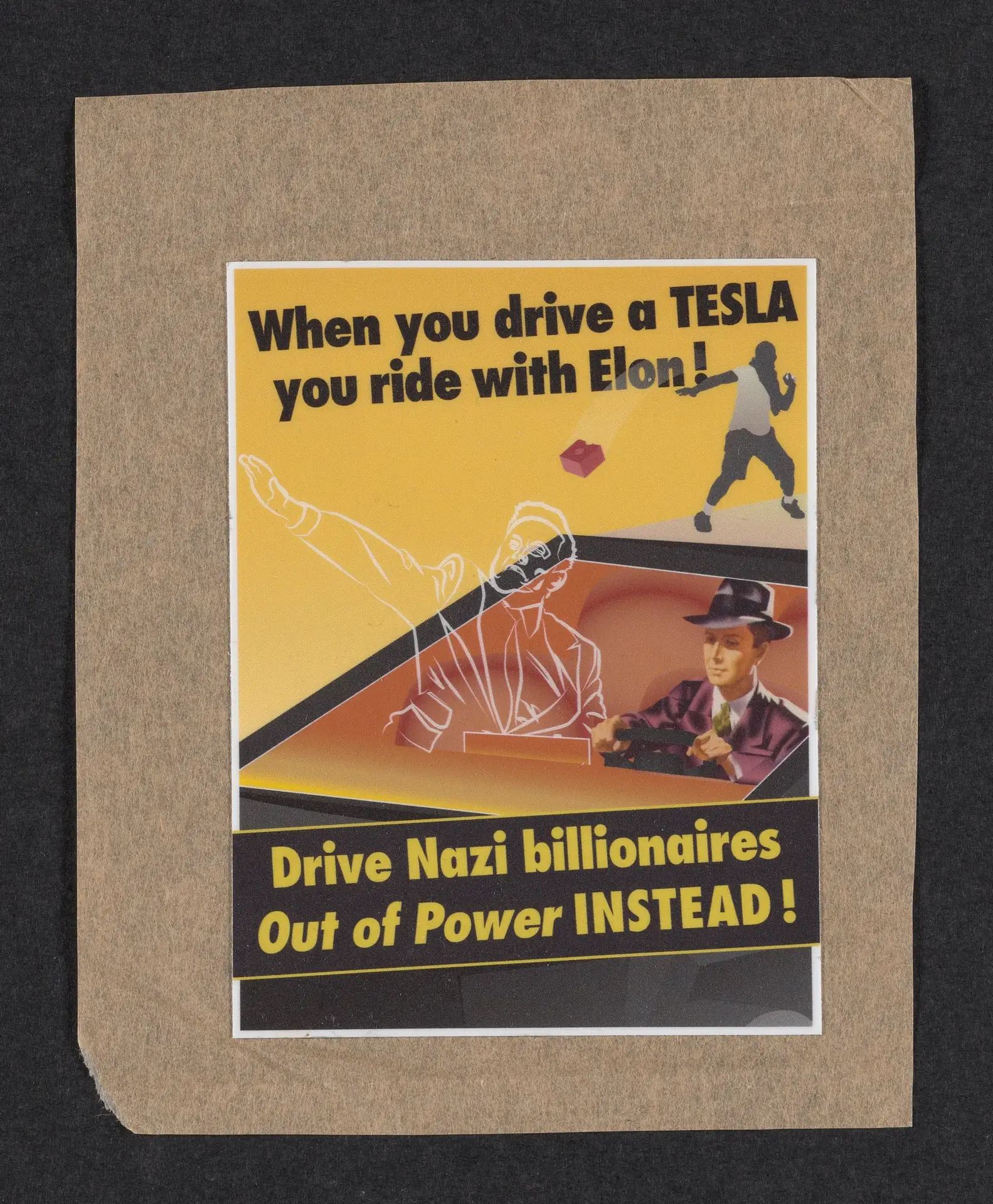 Sticker: “When you drive a TESLA you ride with Elon! Drive Nazi billionaires Out of Power INSTEAD!”